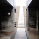Illustration for article titled Watch a concrete WWII bunker get cut in half